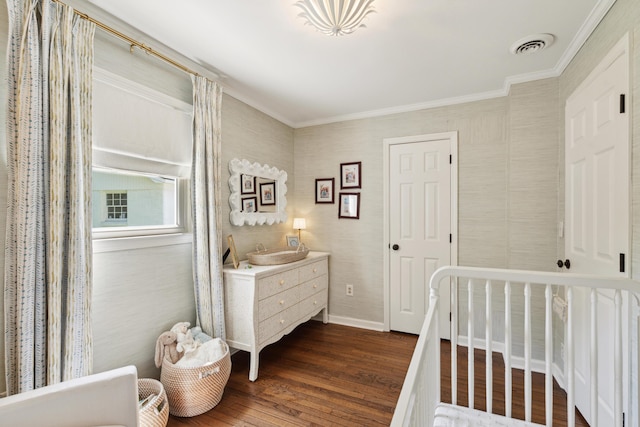 1107 S Shadow Dr, Mount Pleasant, SC 29464 - bedroom with dark wood finished floors, crown molding, baseboards, and a nursery area