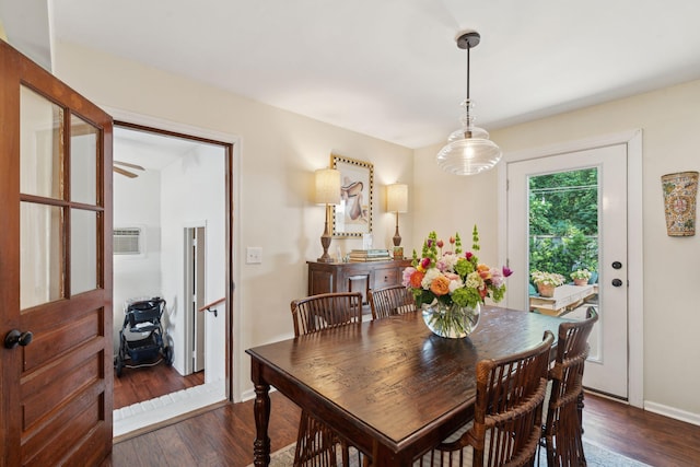 1107 S Shadow Dr, Mount Pleasant, SC 29464 - dining area with dark wood-type flooring, an AC wall unit, and baseboards