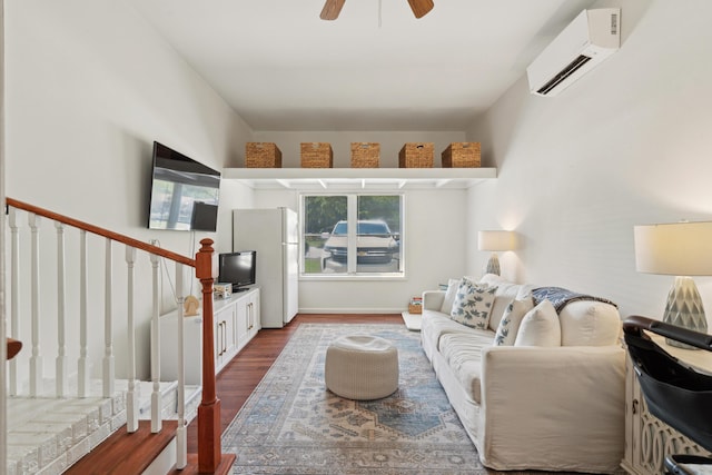 1107 S Shadow Dr, Mount Pleasant, SC 29464 - living room featuring an AC wall unit, dark wood-style floors, ceiling fan, and stairs