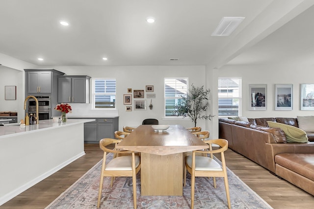 dining room featuring light hardwood / wood-style floors