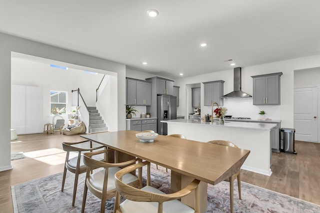 dining space featuring hardwood / wood-style floors