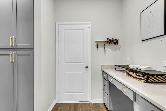 interior space featuring hardwood / wood-style floors and vanity