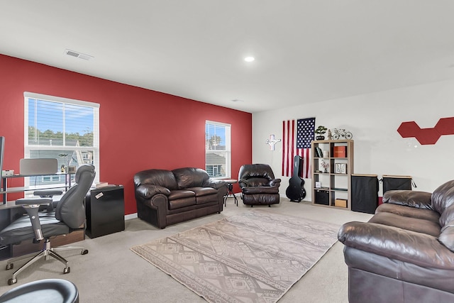 living room featuring light colored carpet