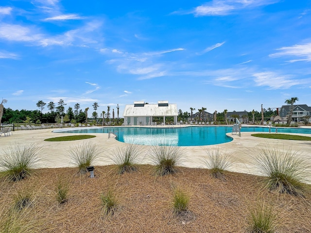 view of pool featuring a patio