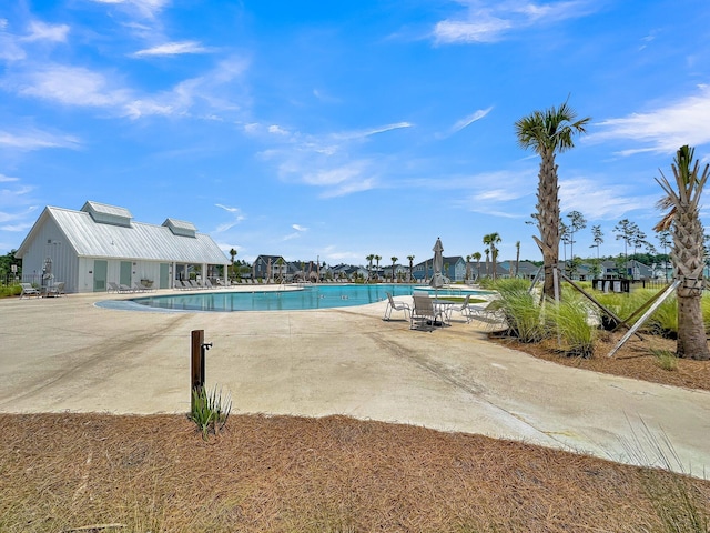 view of pool with a patio