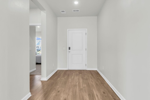 hallway featuring light wood-type flooring