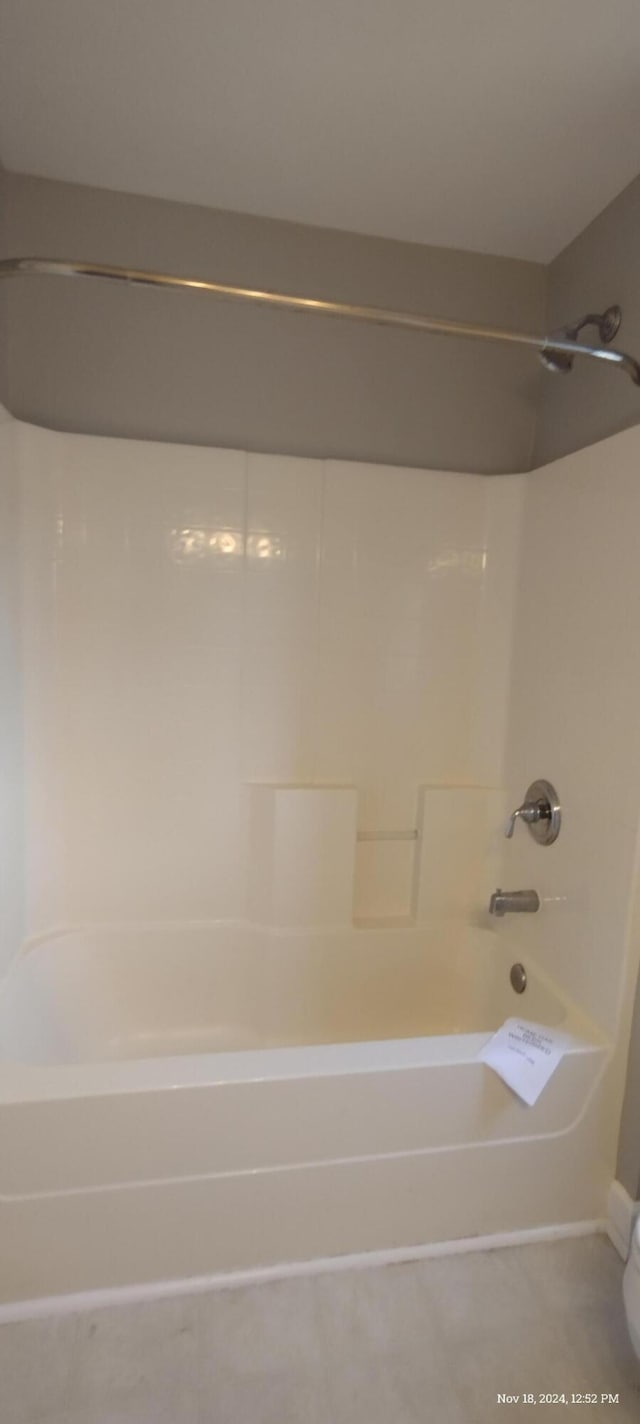 bathroom with shower / bathtub combination