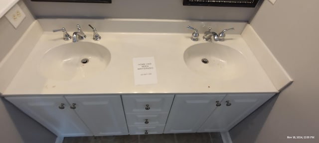 bathroom featuring tile patterned floors and sink