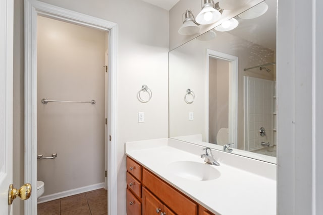 full bathroom featuring tile patterned flooring, vanity, toilet, and washtub / shower combination