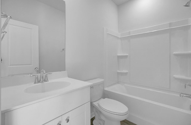 full bathroom featuring shower / tub combination, vanity, and toilet