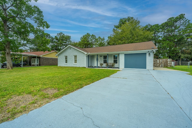 single story home featuring a front yard and a garage