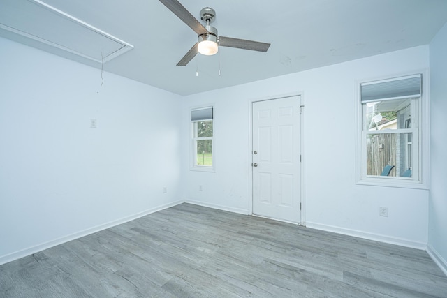 133 Marion Rd, Summerville, SC 29486 - unfurnished room featuring baseboards, a ceiling fan, wood finished floors, and attic access