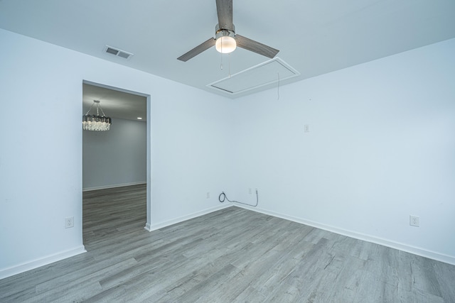 unfurnished room featuring ceiling fan and light hardwood / wood-style floors