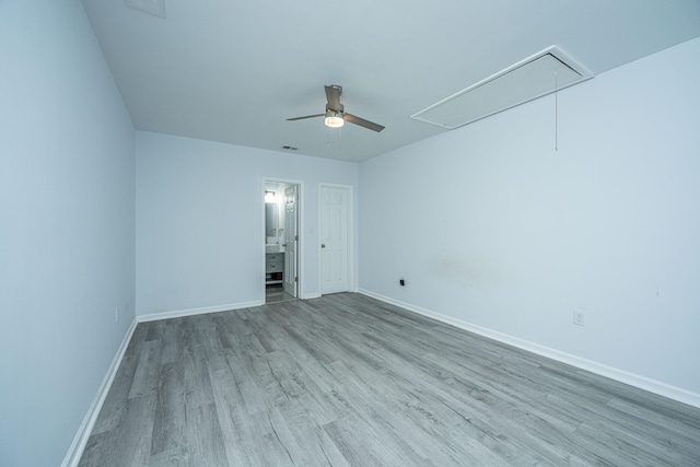 unfurnished room featuring light hardwood / wood-style flooring and ceiling fan