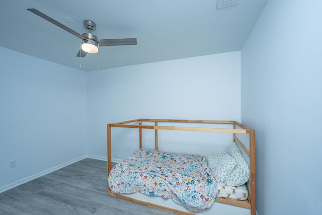 133 Marion Rd, Summerville, SC 29486 - bedroom featuring baseboards, visible vents, wood finished floors, and a ceiling fan