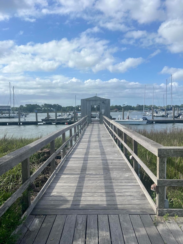 dock area featuring a water view