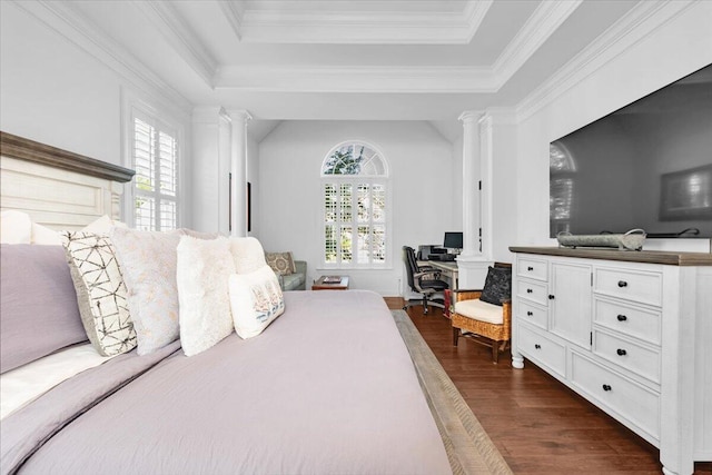 1003 Jervey Point Rd, Wando, SC 29492 - bedroom with dark wood-style floors, decorative columns, a tray ceiling, crown molding, and a desk