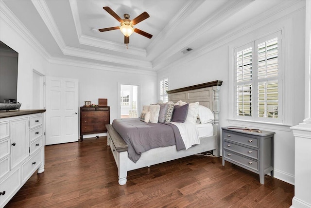 1003 Jervey Point Rd, Wando, SC 29492 - bedroom featuring dark wood finished floors, a tray ceiling, ornamental molding, and ceiling fan