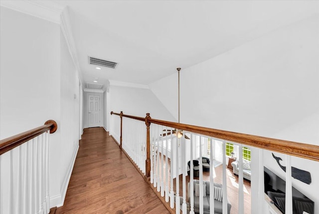 1003 Jervey Point Rd, Wando, SC 29492 - corridor featuring ornamental molding, wood finished floors, and an upstairs landing