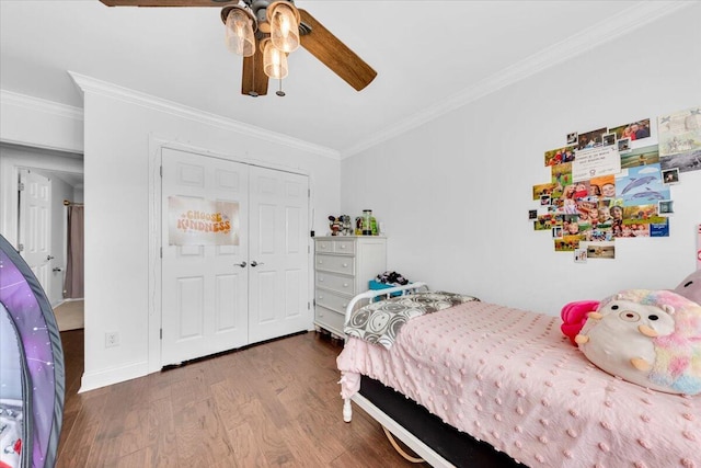 1003 Jervey Point Rd, Wando, SC 29492 - bedroom featuring wood finished floors, ornamental molding, a closet, a ceiling fan, and baseboards