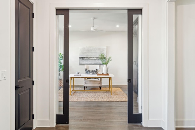 hallway featuring hardwood / wood-style flooring