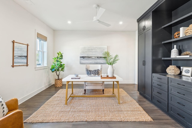 office area with dark hardwood / wood-style flooring and ceiling fan