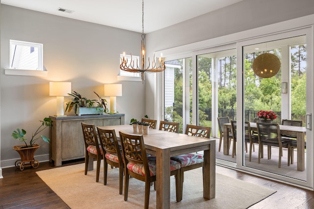 125 Integrity Ln, Charleston, SC 29492 - dining room featuring a chandelier, hardwood / wood-style flooring, and baseboards