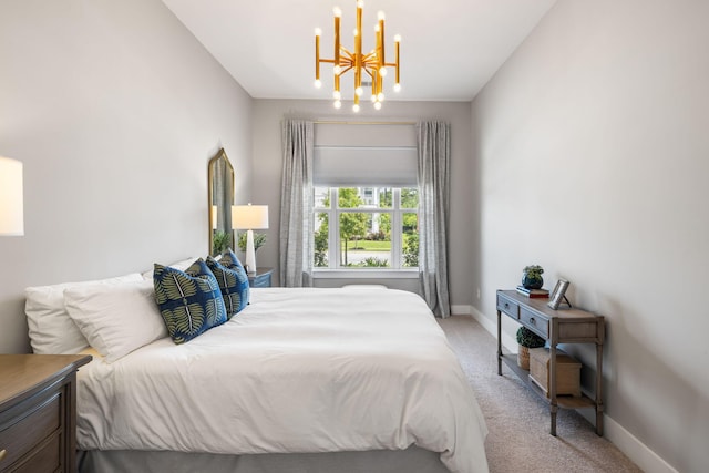 125 Integrity Ln, Charleston, SC 29492 - bedroom with a chandelier, light colored carpet, and baseboards