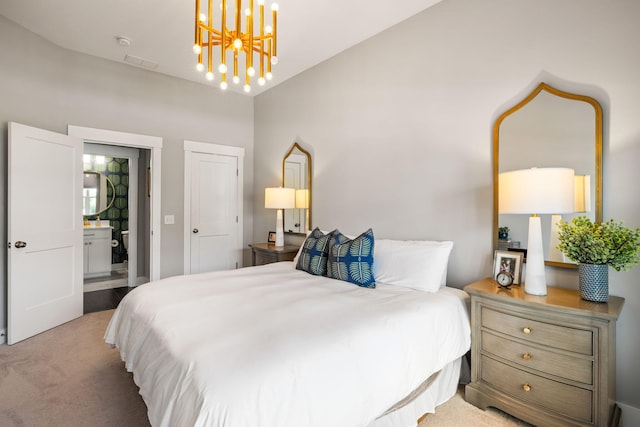 125 Integrity Ln, Charleston, SC 29492 - carpeted bedroom with connected bathroom, a chandelier, and lofted ceiling