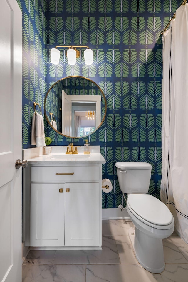 125 Integrity Ln, Charleston, SC 29492 - bathroom with marble finish floors, toilet, vanity, wallpapered walls, and baseboards