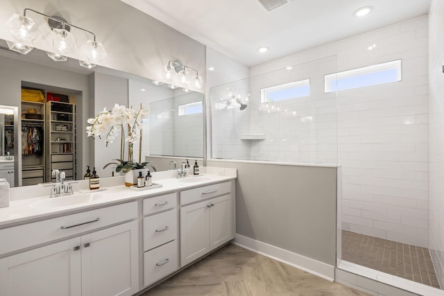 125 Integrity Ln, Charleston, SC 29492 - bathroom with double vanity, a walk in shower, and a walk in closet