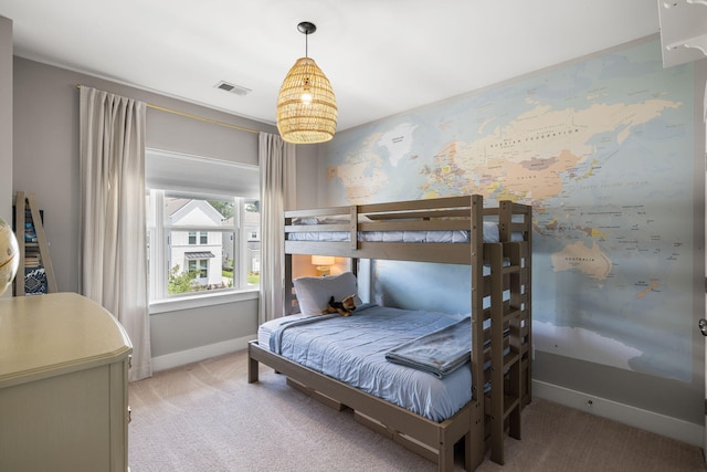 125 Integrity Ln, Charleston, SC 29492 - bedroom featuring light carpet, baseboards, and a chandelier