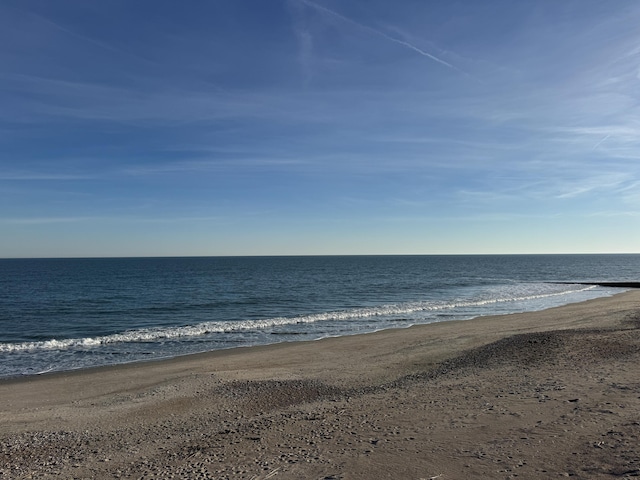 view of water feature with a view of the beach