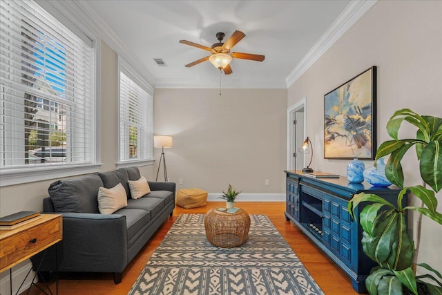 656 Coleman Blvd Unit 405, Mount Pleasant, SC 29464 - living area featuring light wood finished floors, visible vents, baseboards, ceiling fan, and ornamental molding