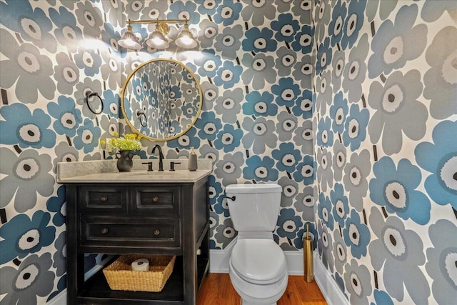 656 Coleman Blvd Unit 405, Mount Pleasant, SC 29464 - half bathroom featuring toilet, wallpapered walls, and wood finished floors