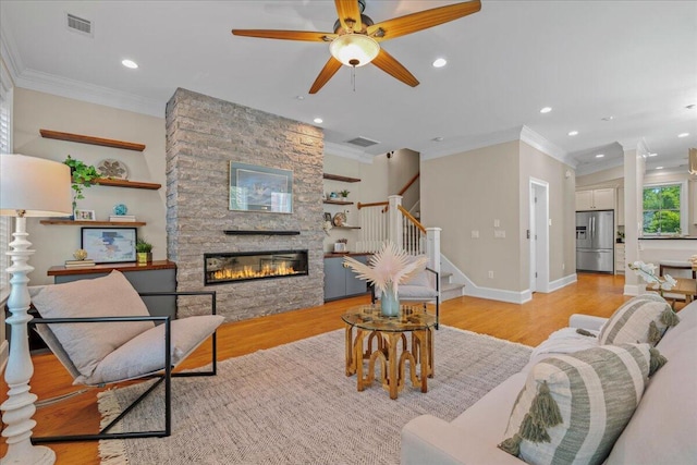 656 Coleman Blvd Unit 405, Mount Pleasant, SC 29464 - living area with crown molding, light wood-type flooring, and visible vents
