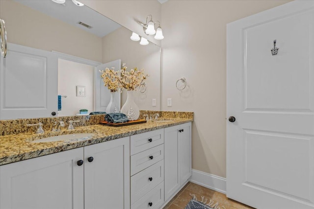 656 Coleman Blvd Unit 405, Mount Pleasant, SC 29464 - bathroom with a sink, double vanity, visible vents, and tile patterned floors