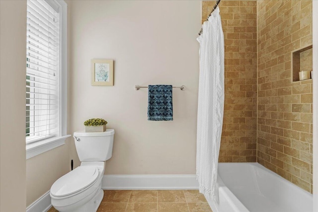 656 Coleman Blvd Unit 405, Mount Pleasant, SC 29464 - full bathroom featuring tile patterned flooring, toilet, baseboards, and shower / bathtub combination with curtain