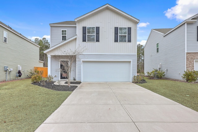 view of front facade with concrete driveway, an attached garage, and a front lawn