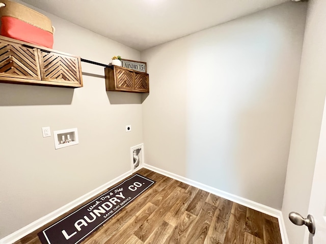 washroom with laundry area, baseboards, wood finished floors, hookup for a washing machine, and hookup for an electric dryer