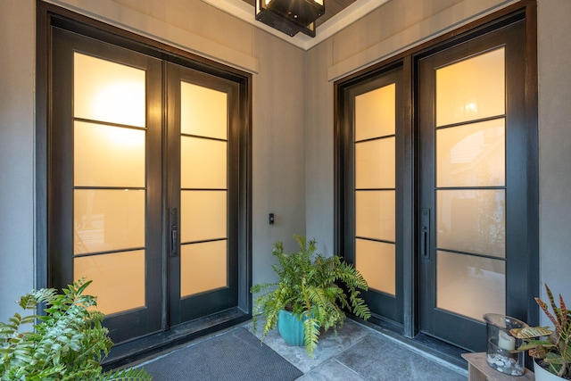 entrance to property featuring french doors