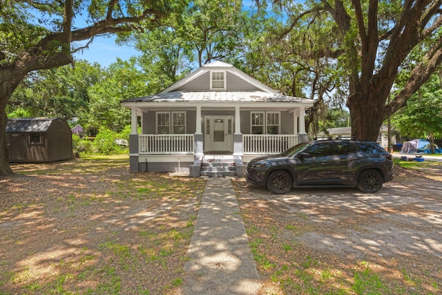 2170 Midland Park Rd, North Charleston, SC 29406 - bungalow featuring a storage shed and a porch