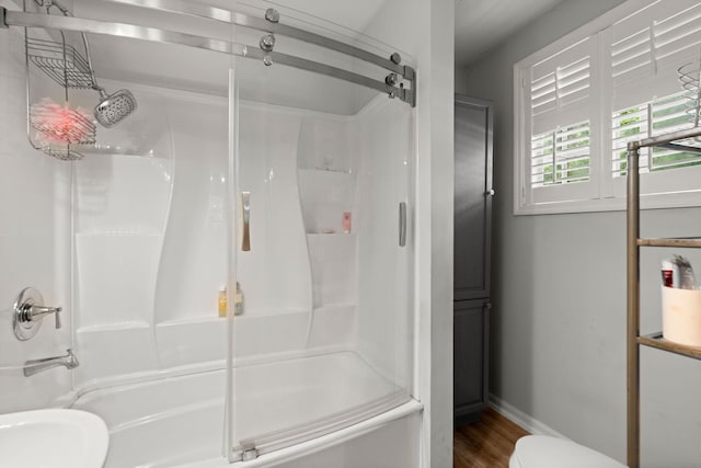 2170 Midland Park Rd, North Charleston, SC 29406 - bathroom featuring enclosed tub / shower combo and wood finished floors