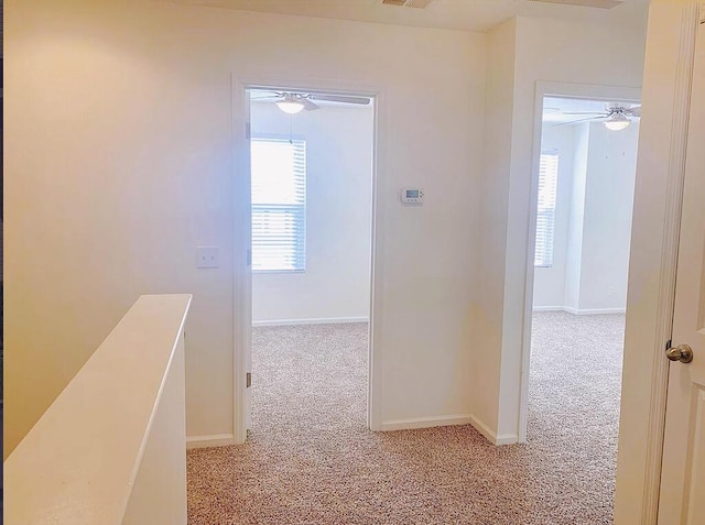 9088 Parlor Dr, Ladson, SC 29456 - hallway with carpet floors, an upstairs landing, and baseboards