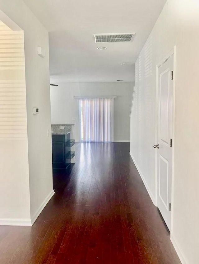 9088 Parlor Dr, Ladson, SC 29456 - corridor featuring dark wood-type flooring and baseboards