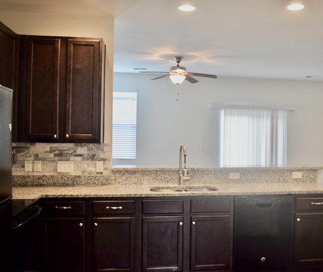 9088 Parlor Dr, Ladson, SC 29456 - kitchen with black appliances, a sink, dark brown cabinets, a ceiling fan, and light stone countertops