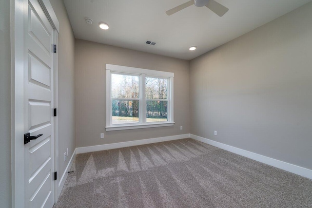 carpeted empty room with recessed lighting, visible vents, ceiling fan, and baseboards