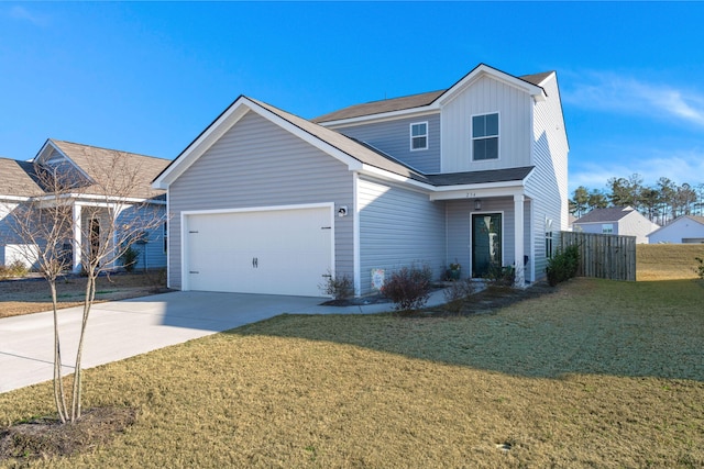 view of front of house featuring a garage and a front lawn