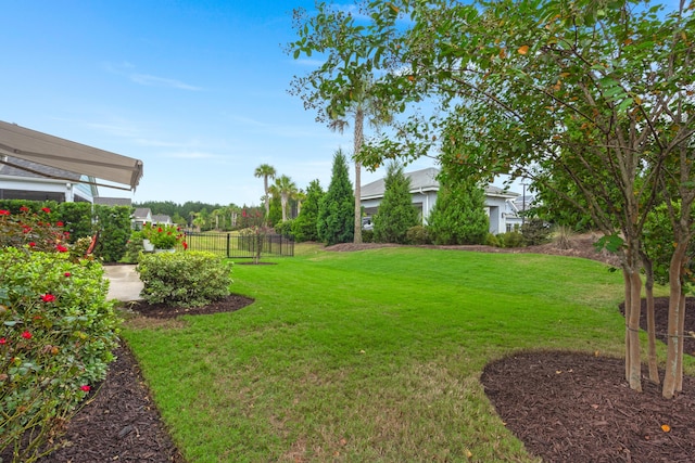 view of yard with fence