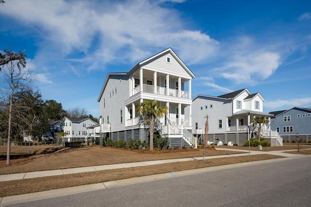 view of front facade featuring a balcony